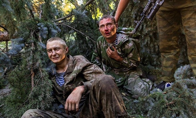 Wounded Ukrainian paratroopers taken captive during a combat operation in Shakhtyorsk.