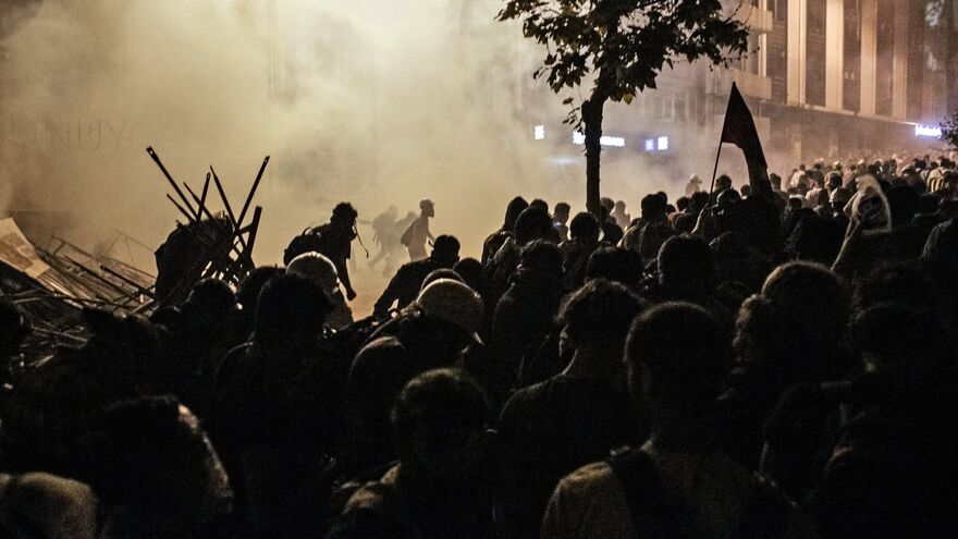 Protesters clash with police in Besiktas district near Taksim Square in Istanbul.