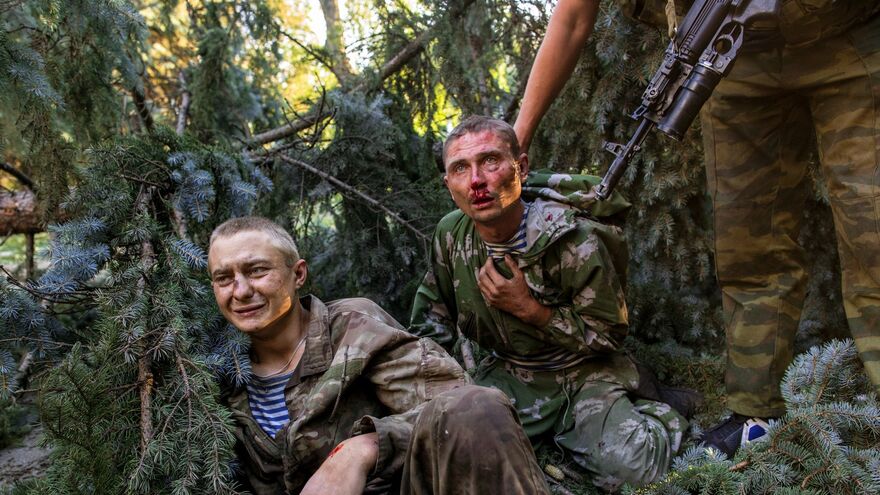 Wounded Ukrainian paratroopers taken captive during a combat operation in Shakhtyorsk.