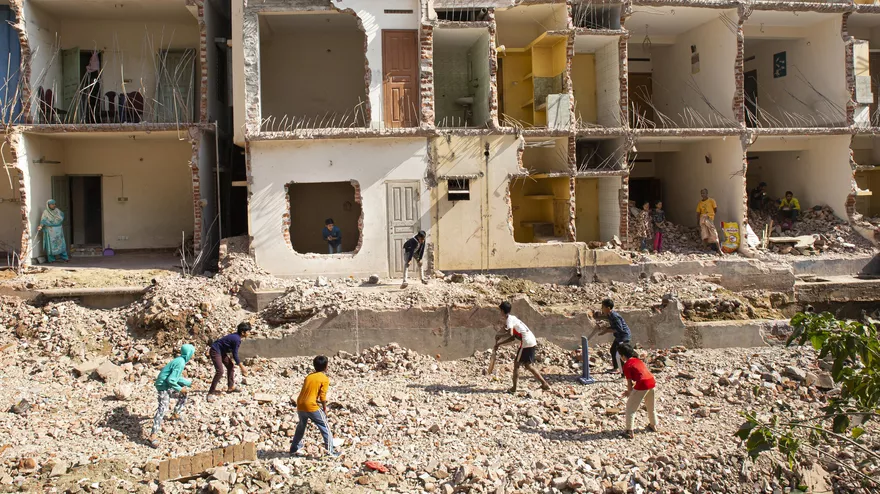 Children of Chittagong are playing on piles of dirt