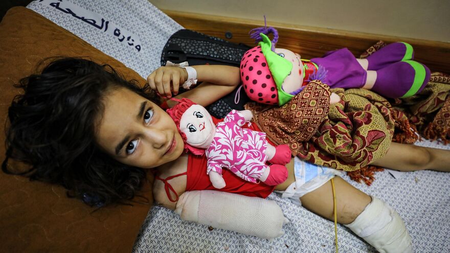 Shaima… A severed childhood embracing what remains of her world