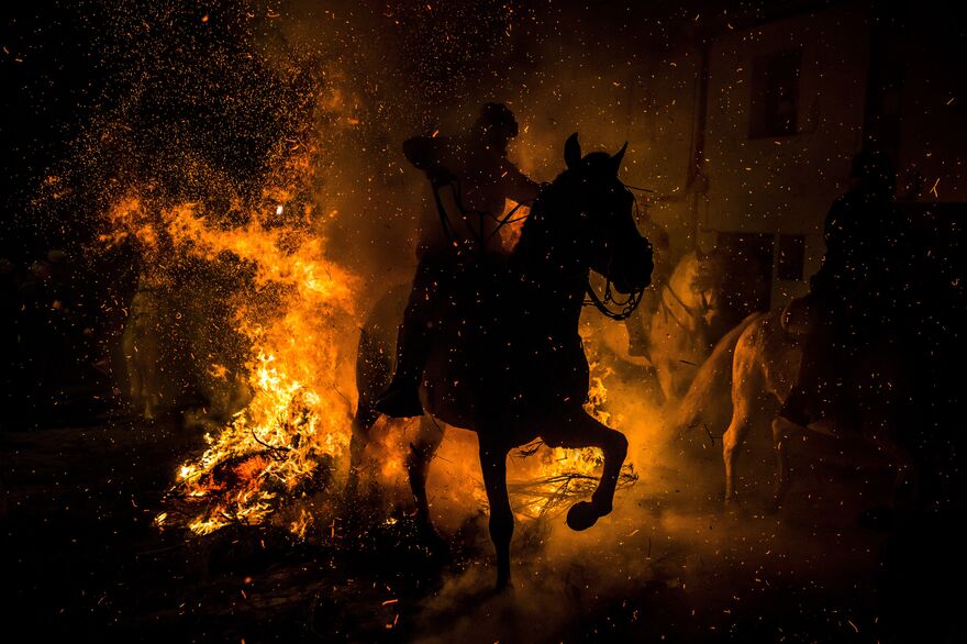 Las Luminarias: a Spanish festival of fire and horses.